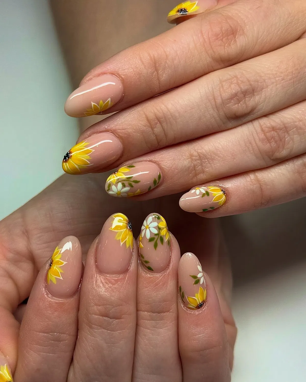 Mixed floral set: yellow blooms, white flowers, and green leaves