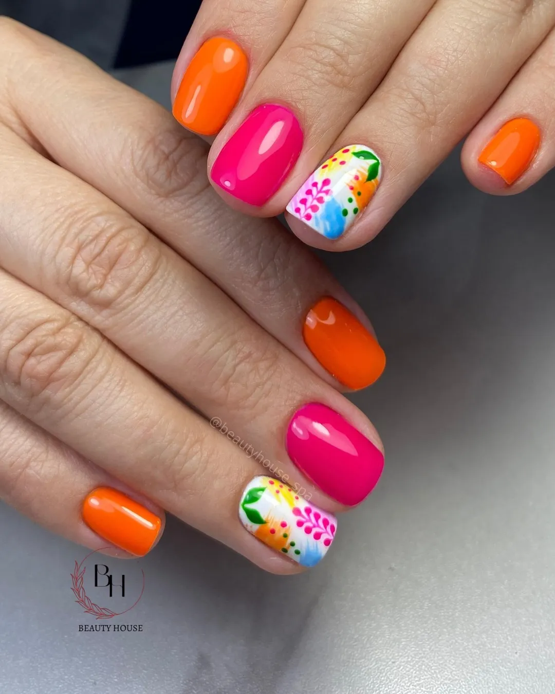 Hot pink and orange solids with floral-pattern accents