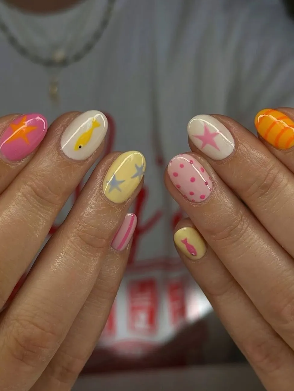 Pastel mix with stars, dots, and small graphic silhouettes