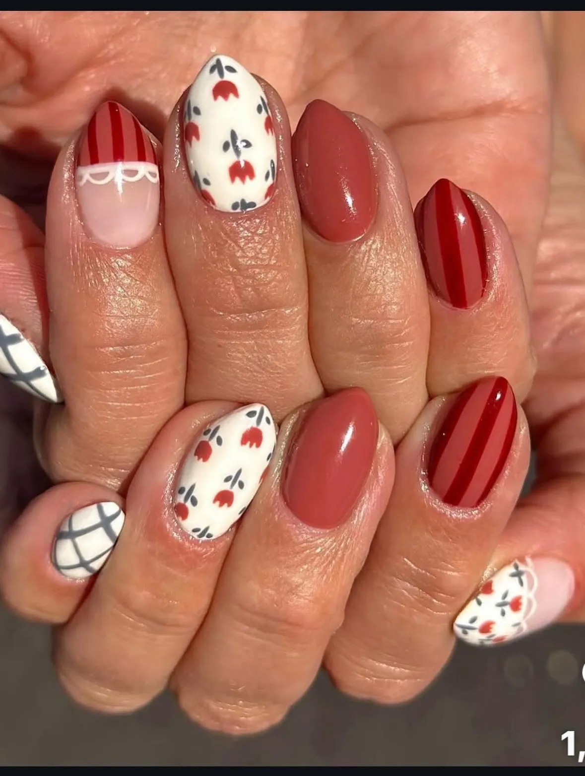 Red stripes, grid accents, and small floral-like motifs