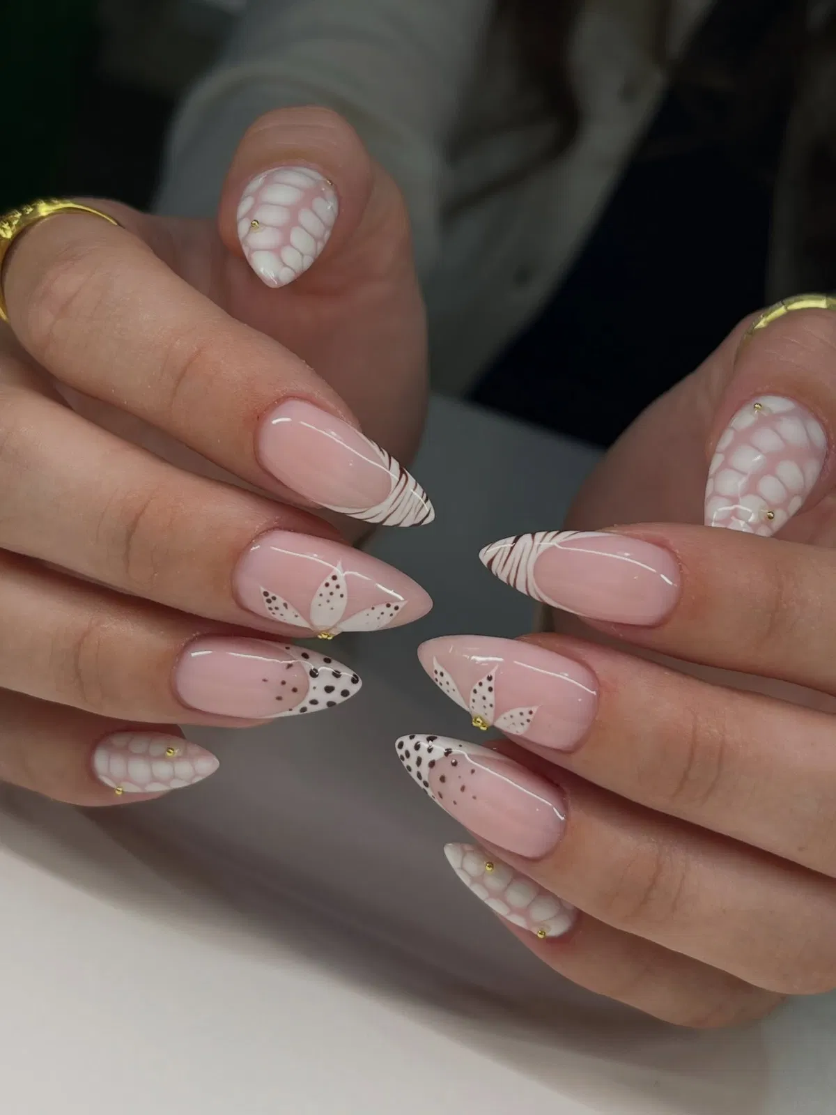 Nude almonds with white line tips and dotted petal accents