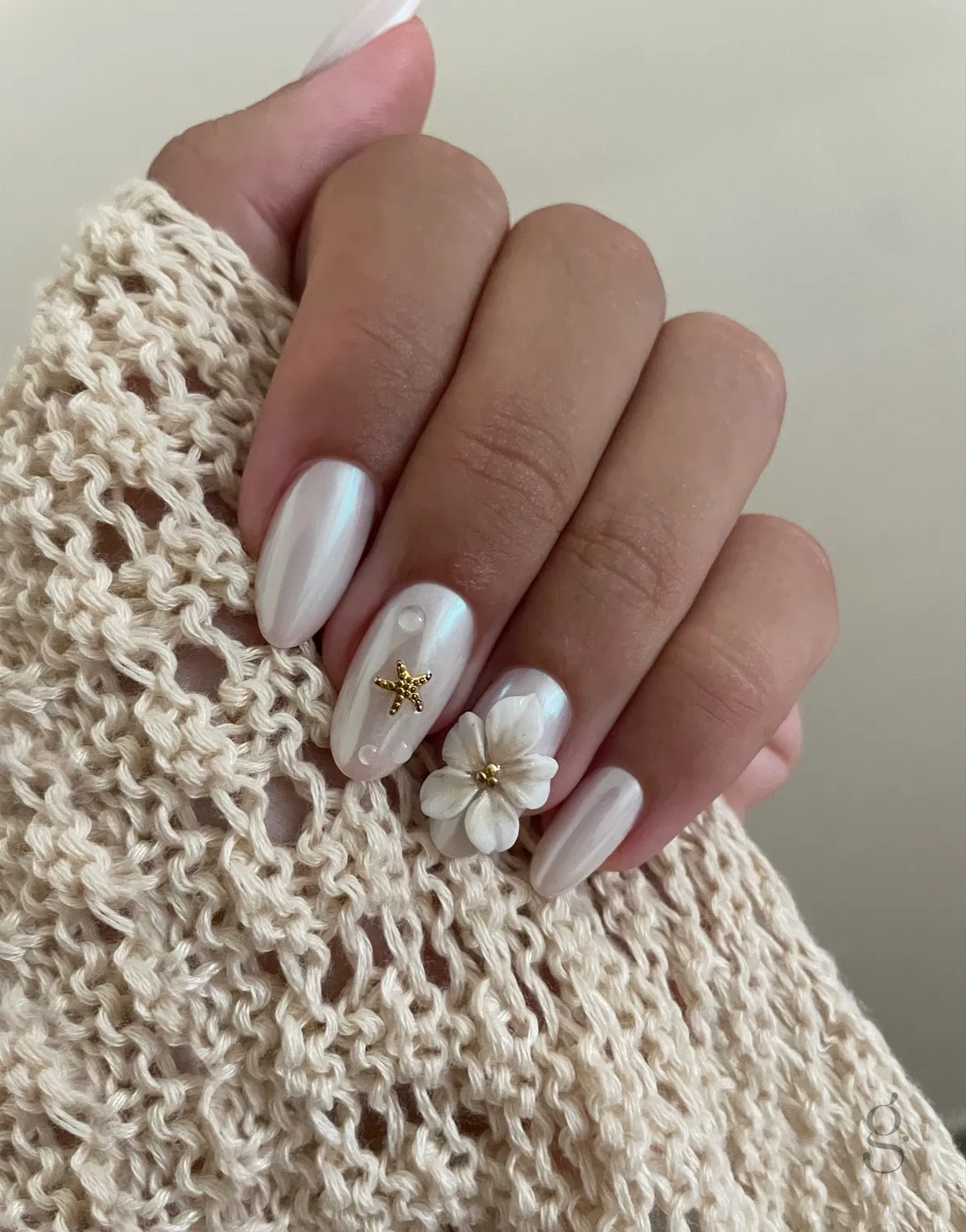 Pearly white almonds with starfish charm and 3D flower