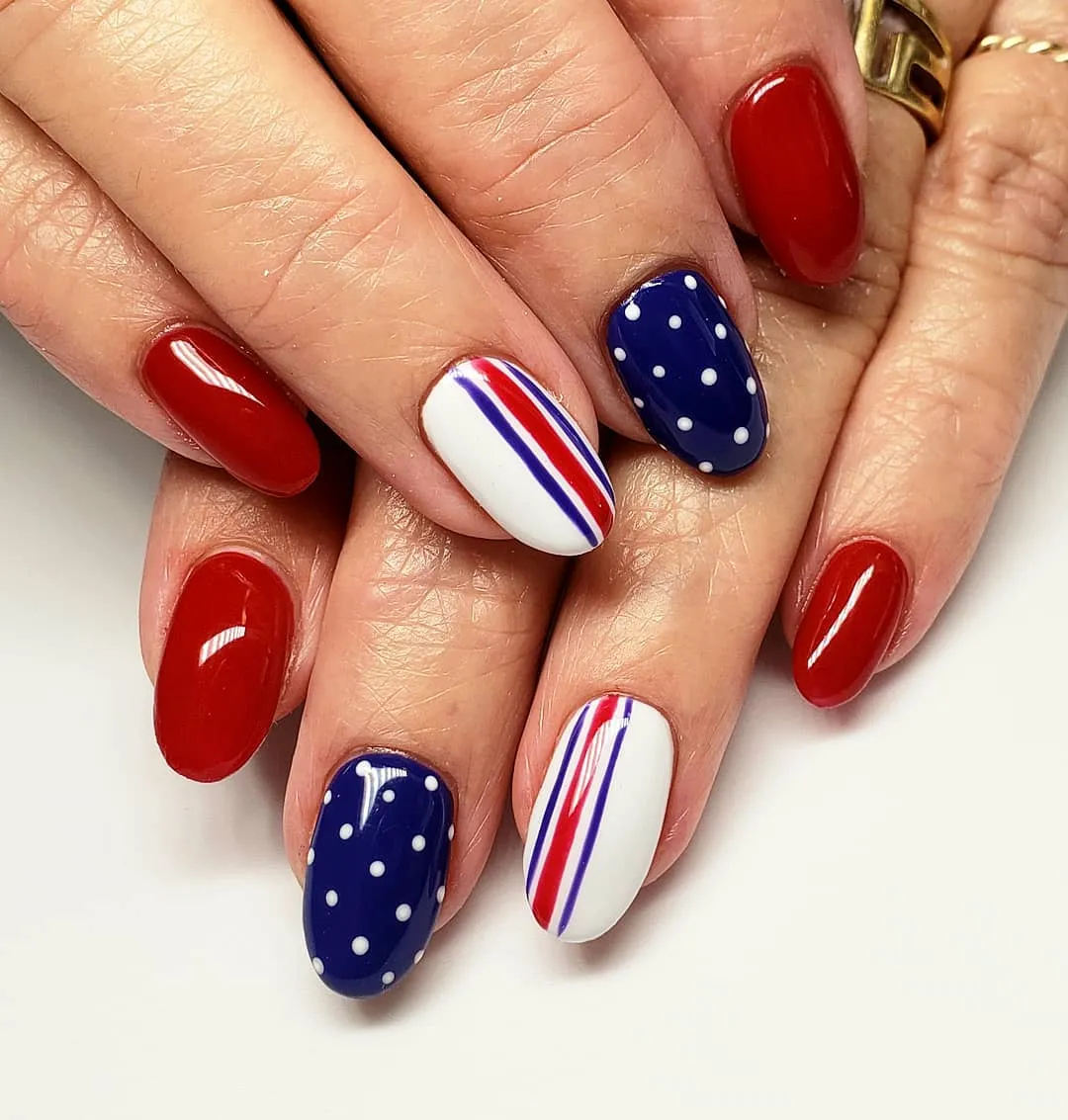 Classic red with striped white accents and navy polka dots