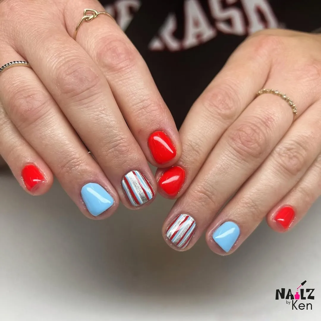 Bright red and light blue with silver-striped accents