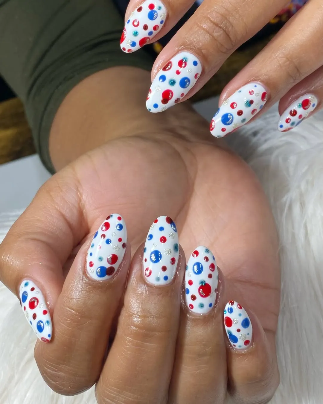 White base with red and blue confetti dots