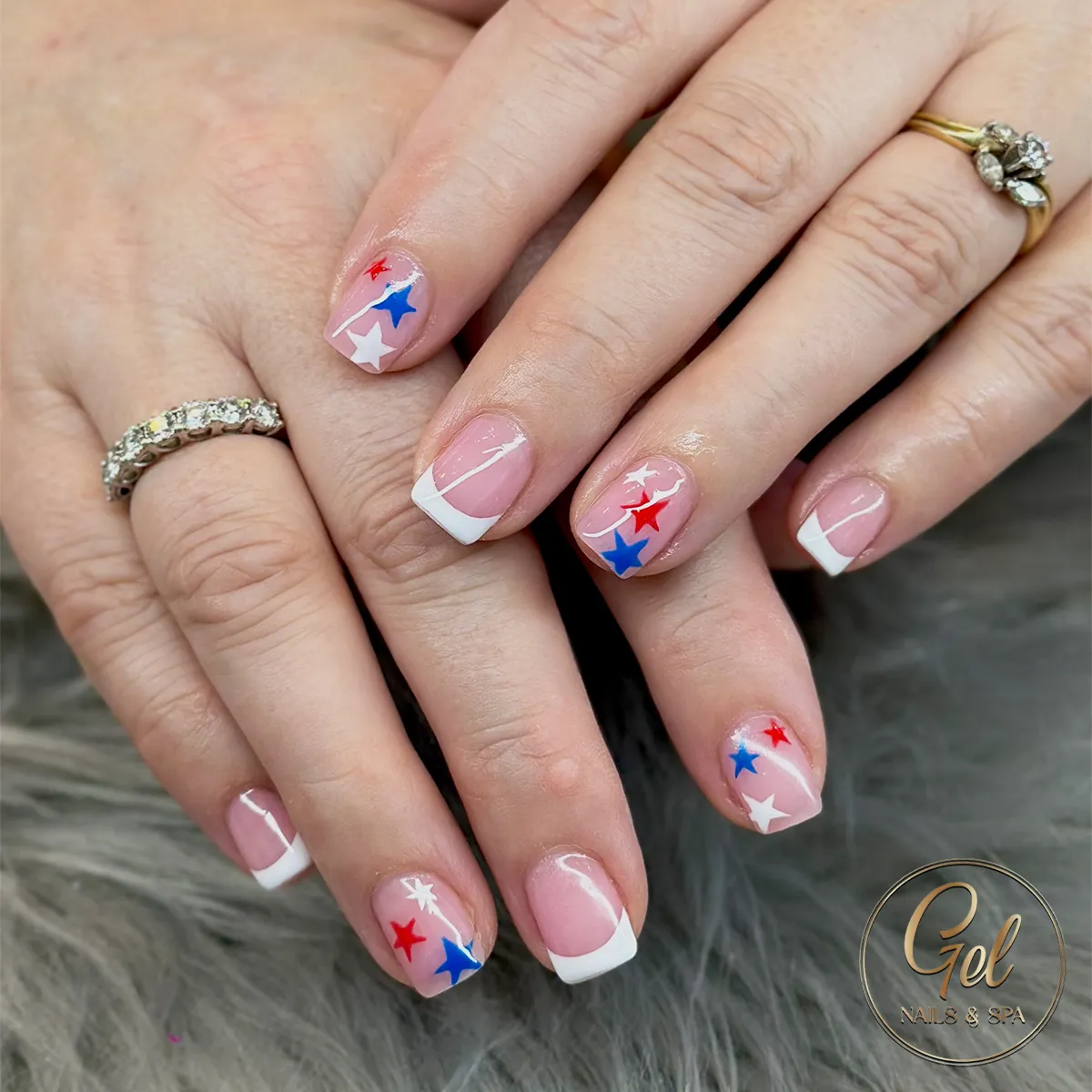 Pink-and-White French Tips with Star Accents