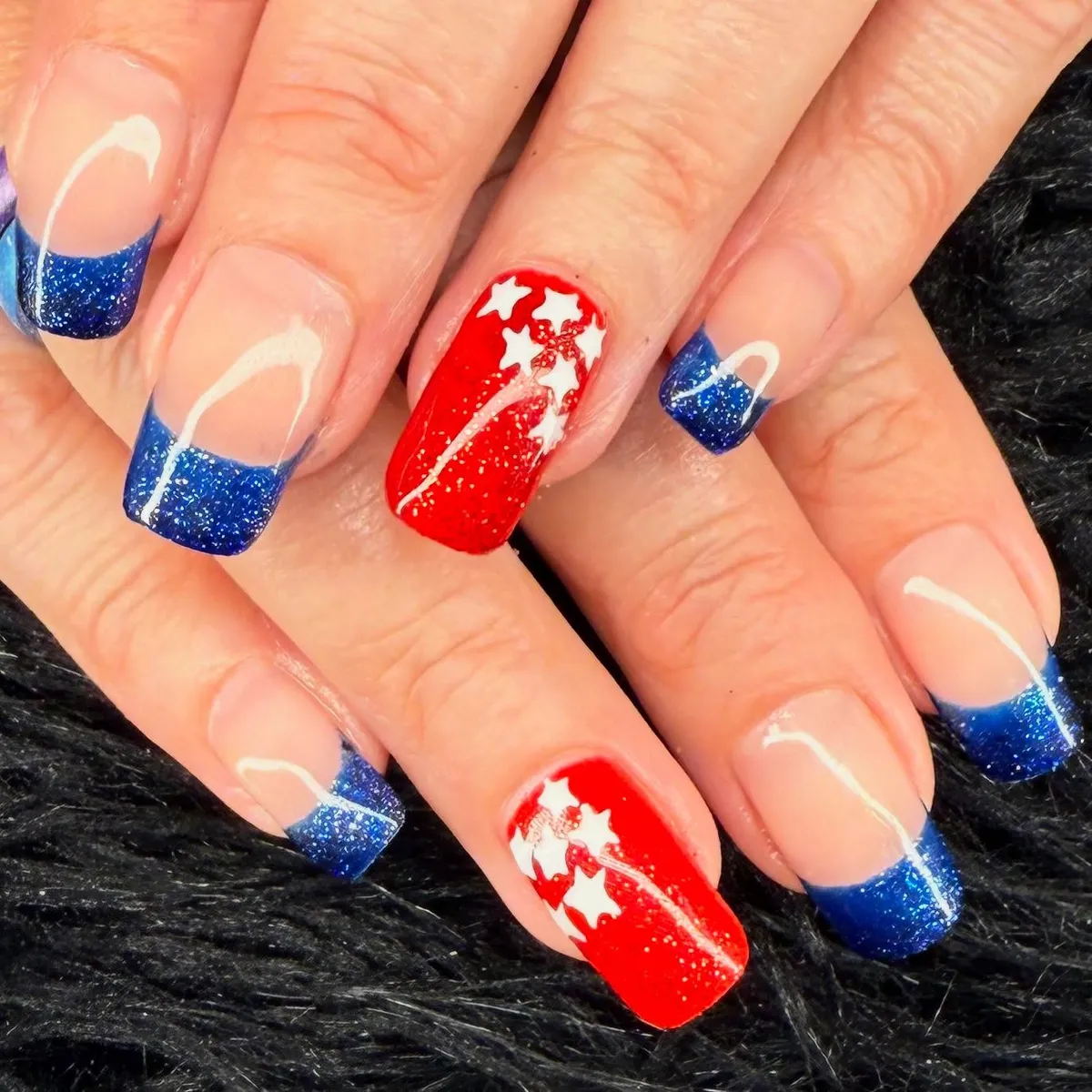 Blue Glitter French Tips with Red Star Accents