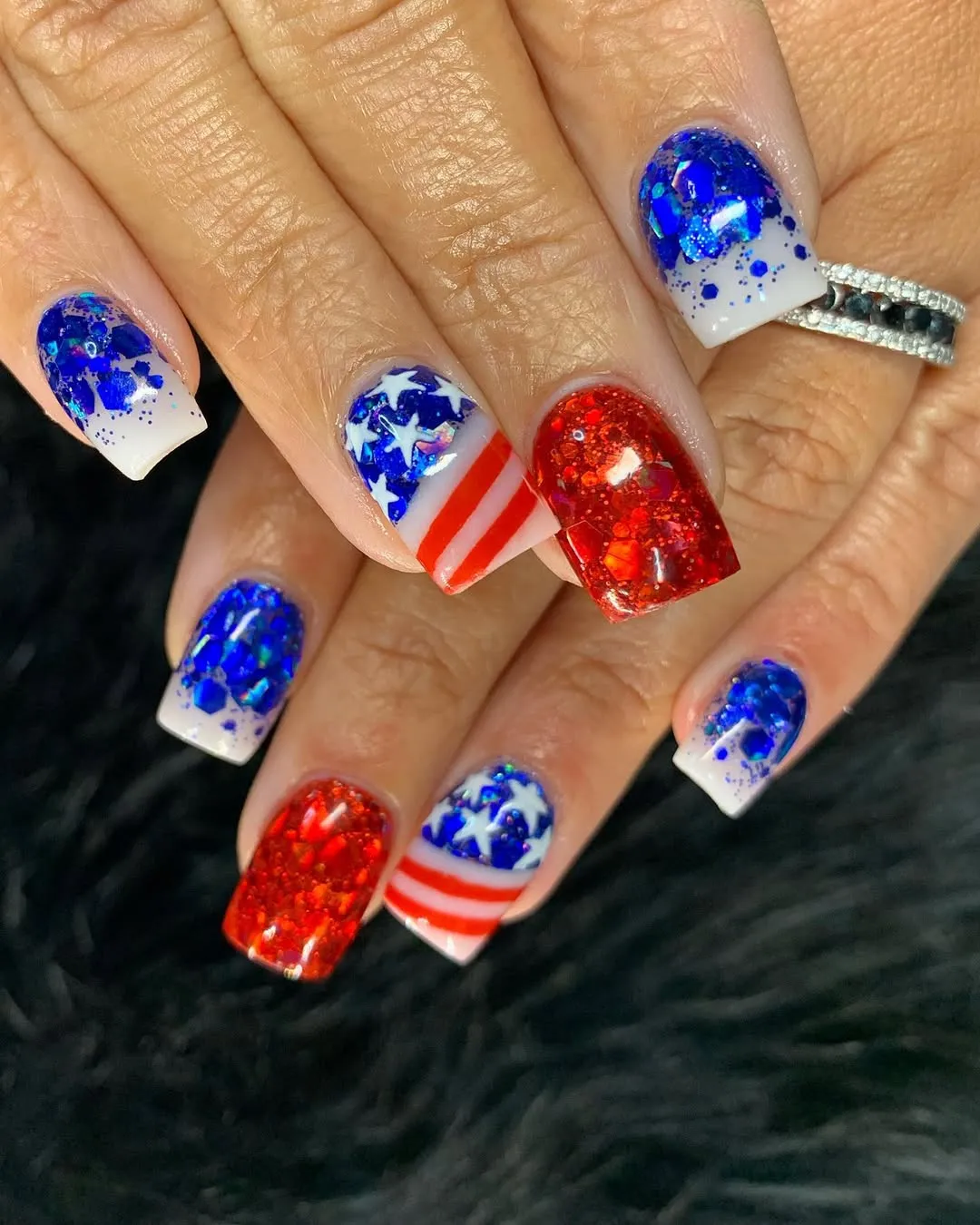 Chunky glitter mix with star-and-stripe feature nails