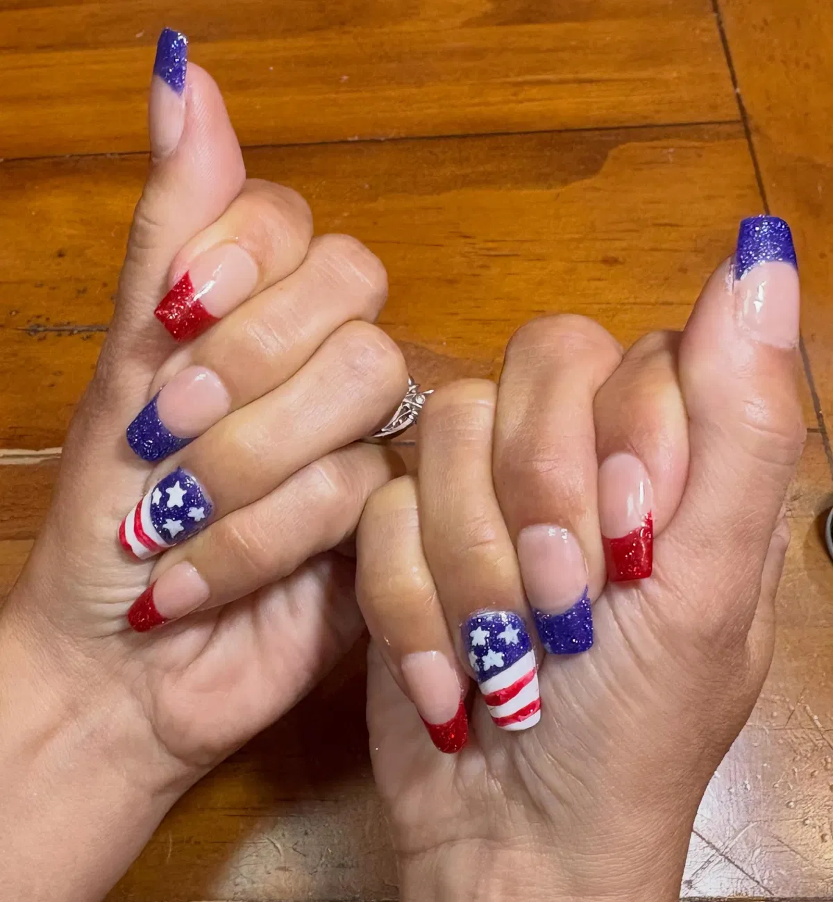 Red and blue French tips with star-and-stripe accents