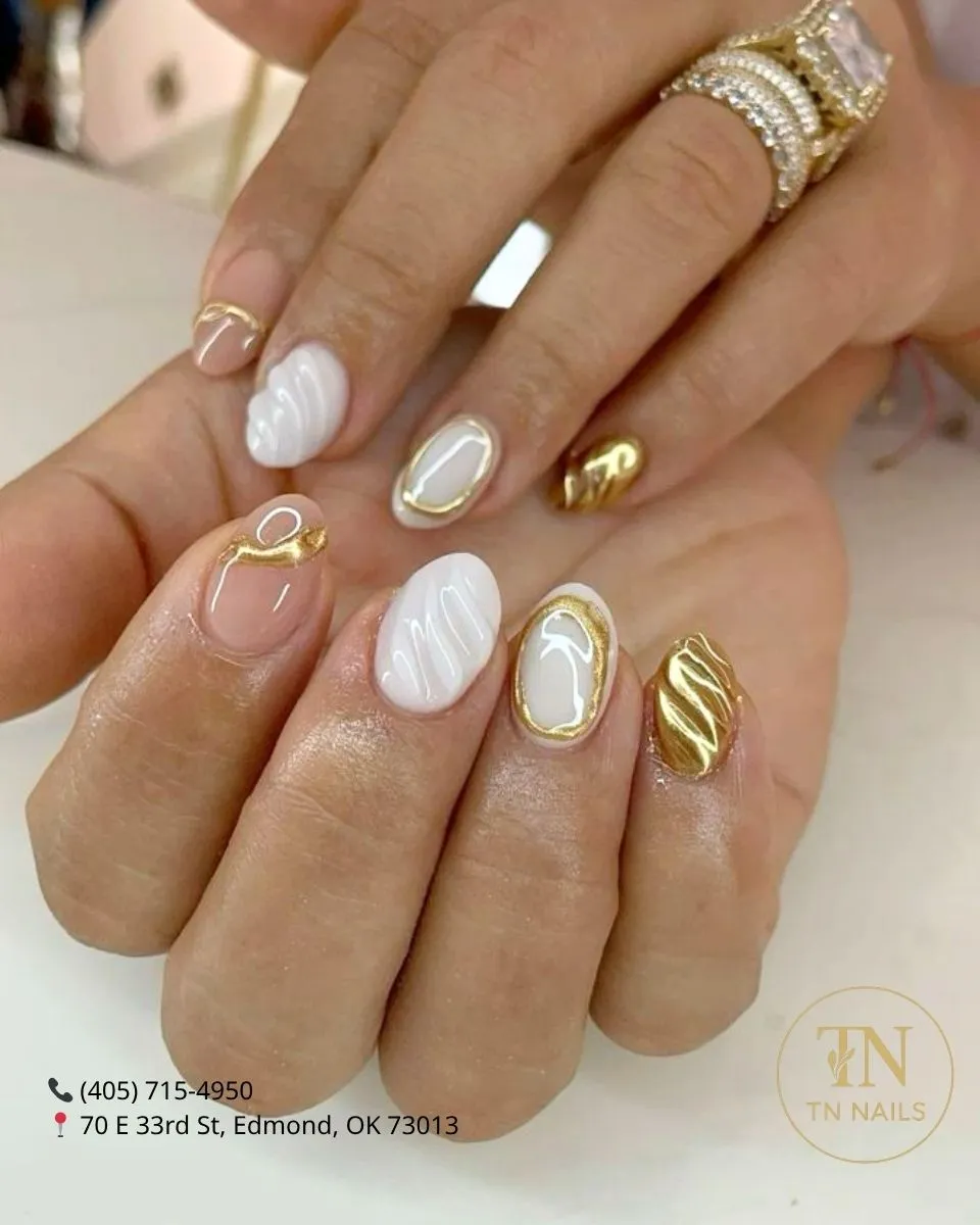 Nude and milky white mix with gold outlines and raised white texture