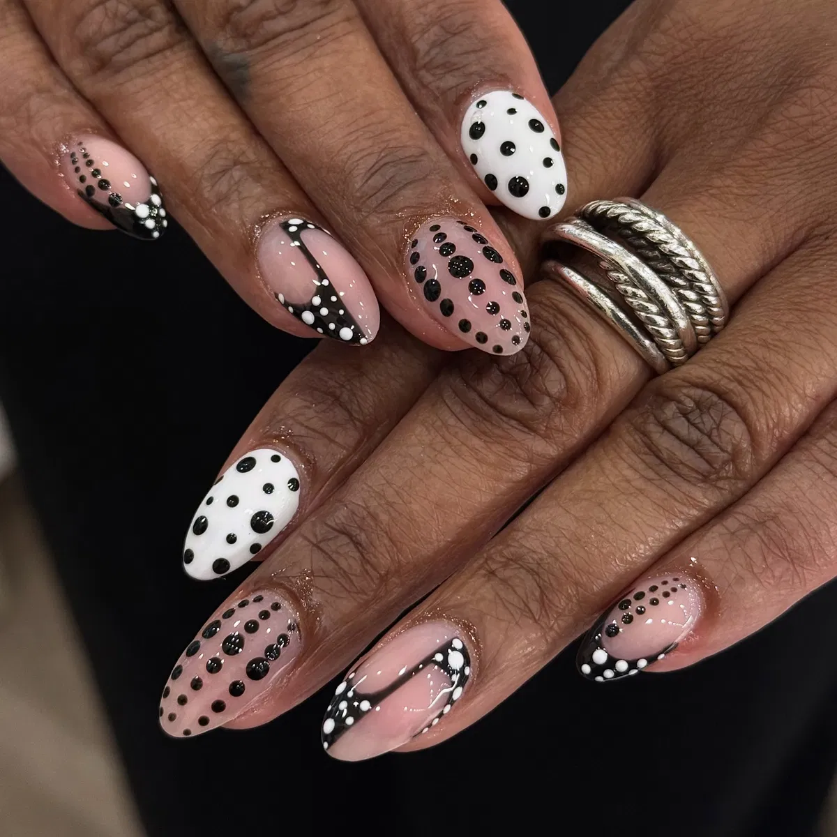 Mixed nude and white bases with black-and-white dot accents