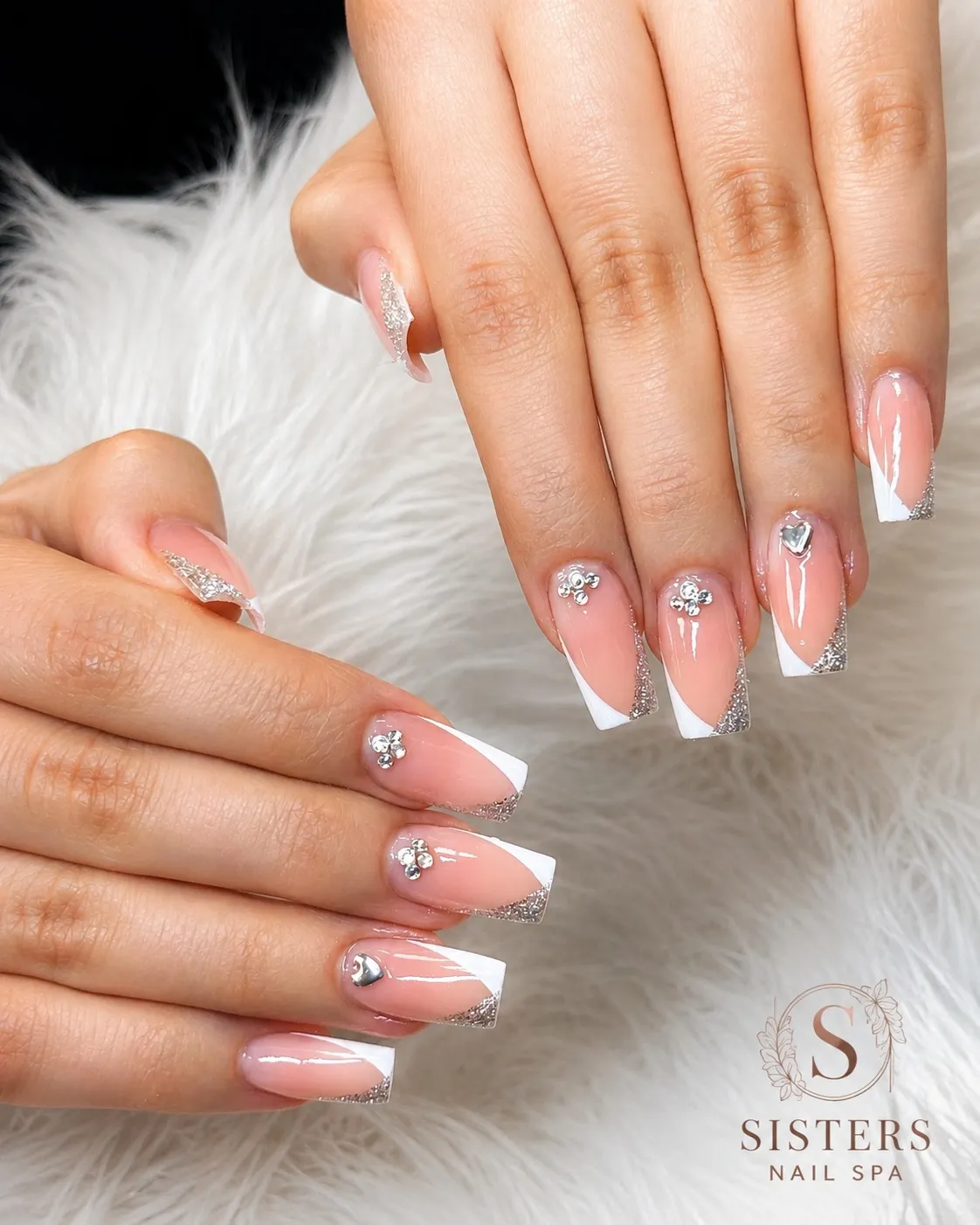 Diagonal French tips with silver glitter and rhinestones