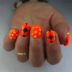 π€ 17+ Orange and Black Nails π§‘That Turn Every Look Into a Bold Statement Fashion image by @nailsbyjohasselt