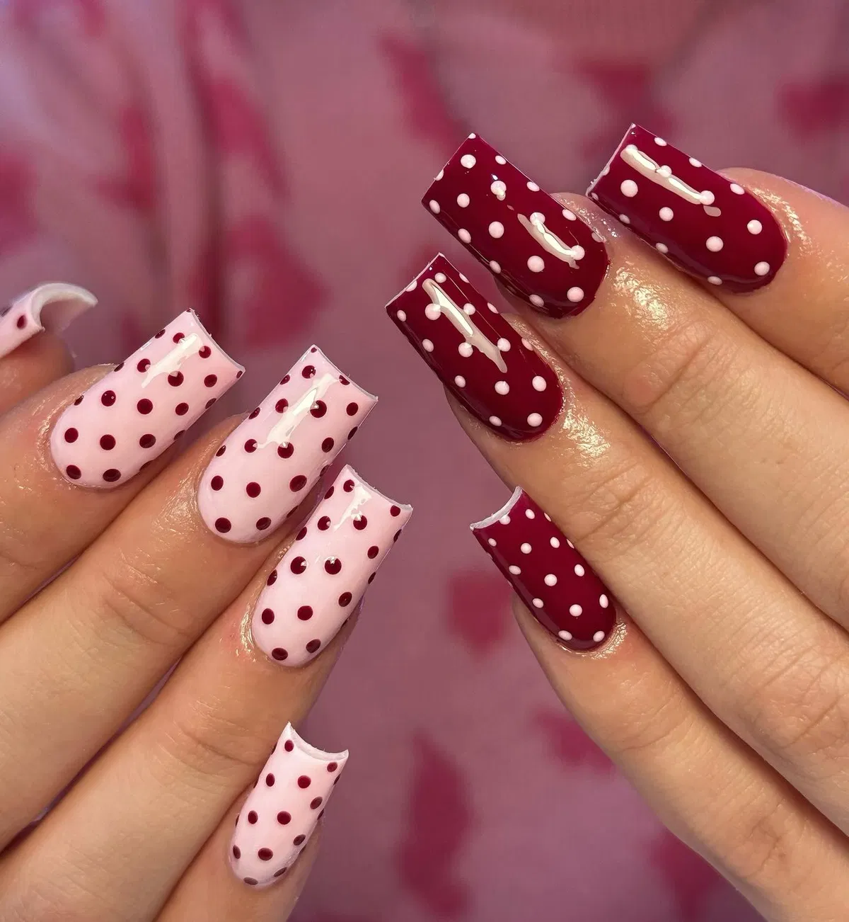 Alternating burgundy and pink polka-dot blocks