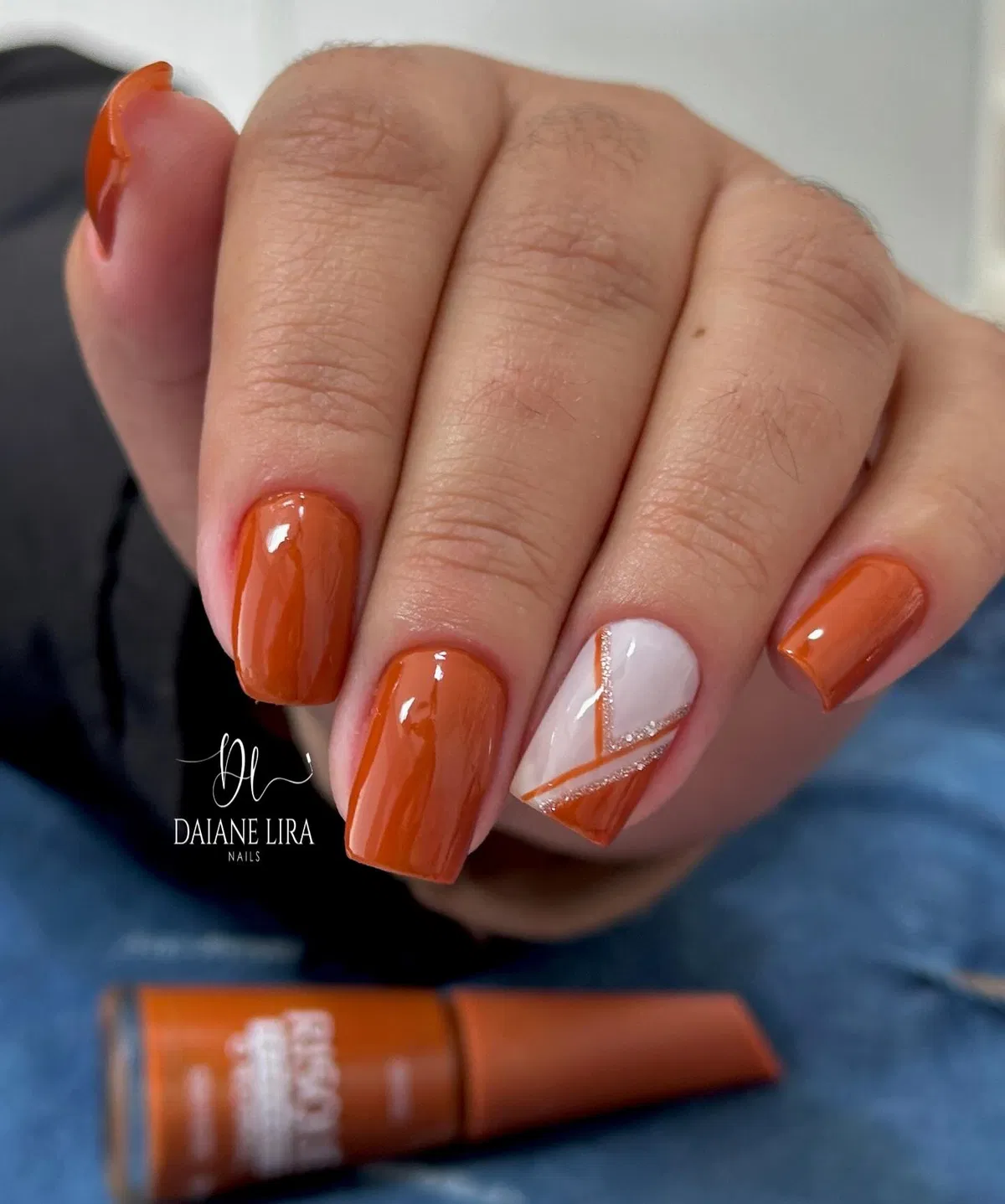 Burnt orange solids with white-and-orange geometric accent