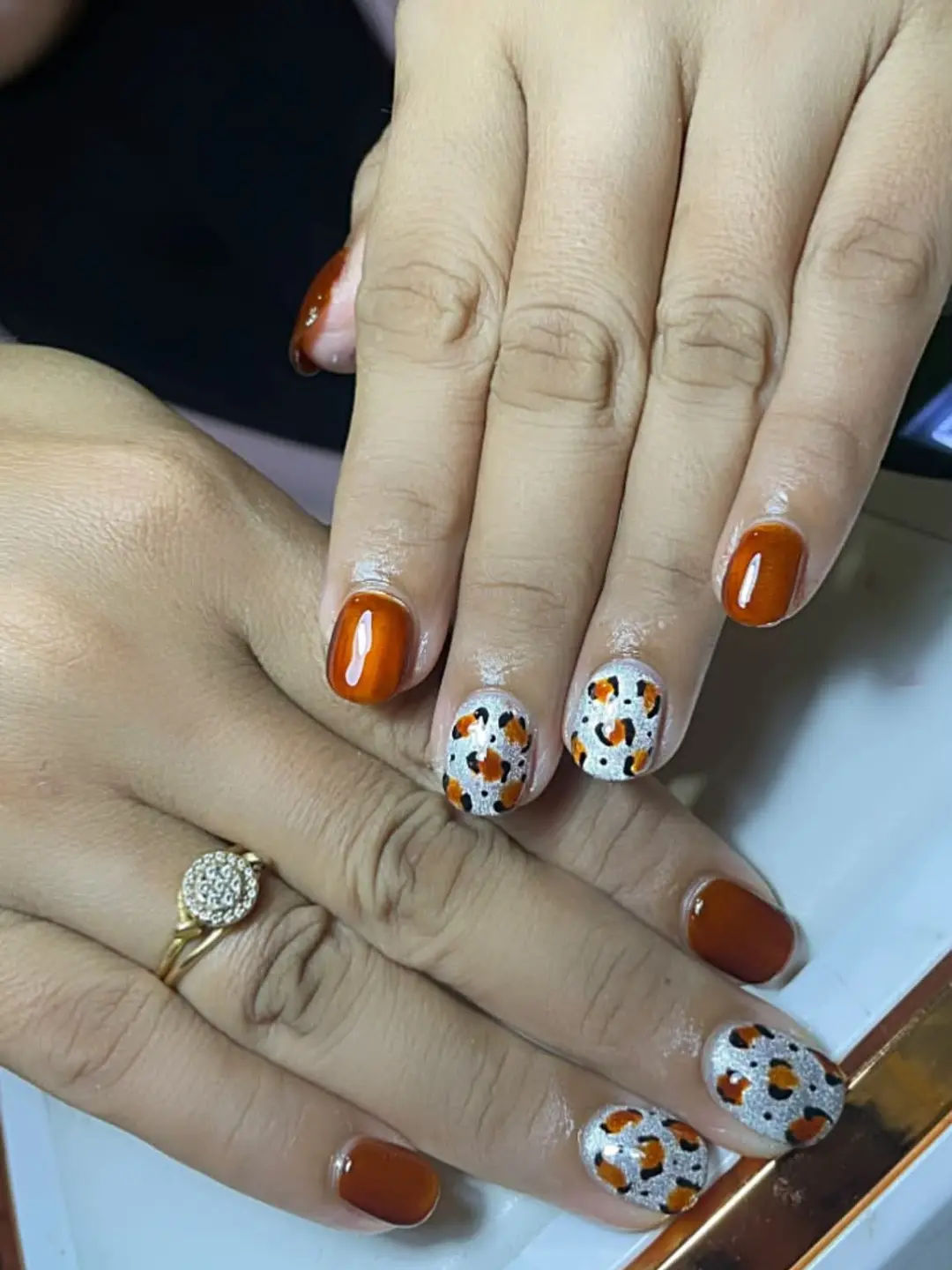 Burnt orange with white spotted accents