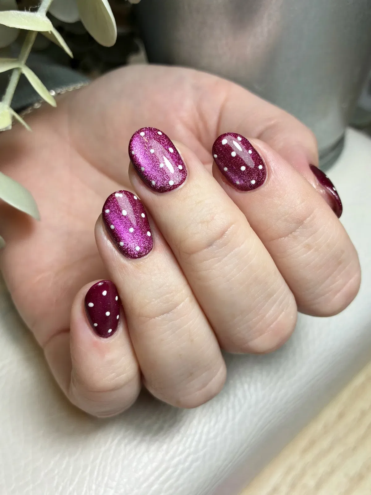 Pink shimmer with dots and wavy white lines
