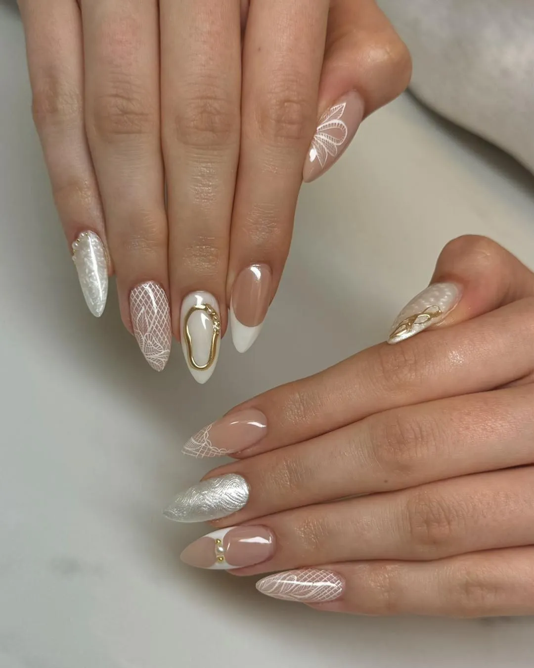 Mixed nude, white, and lace-style linework with gold frame accent