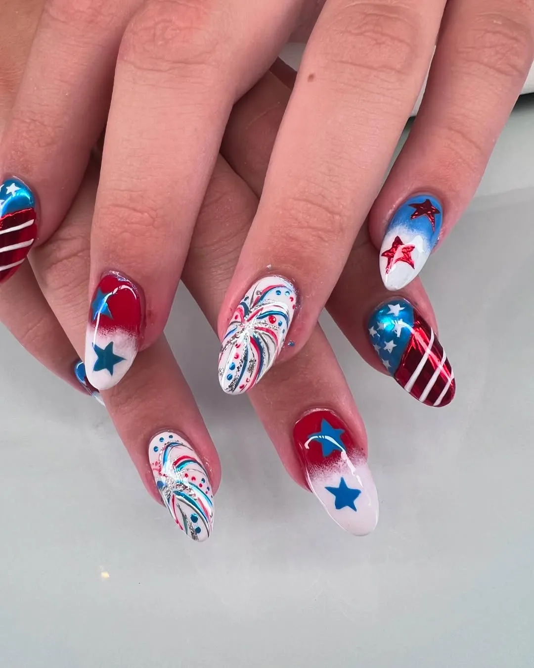 Gradients with Stars and a Swirl Accent Nail