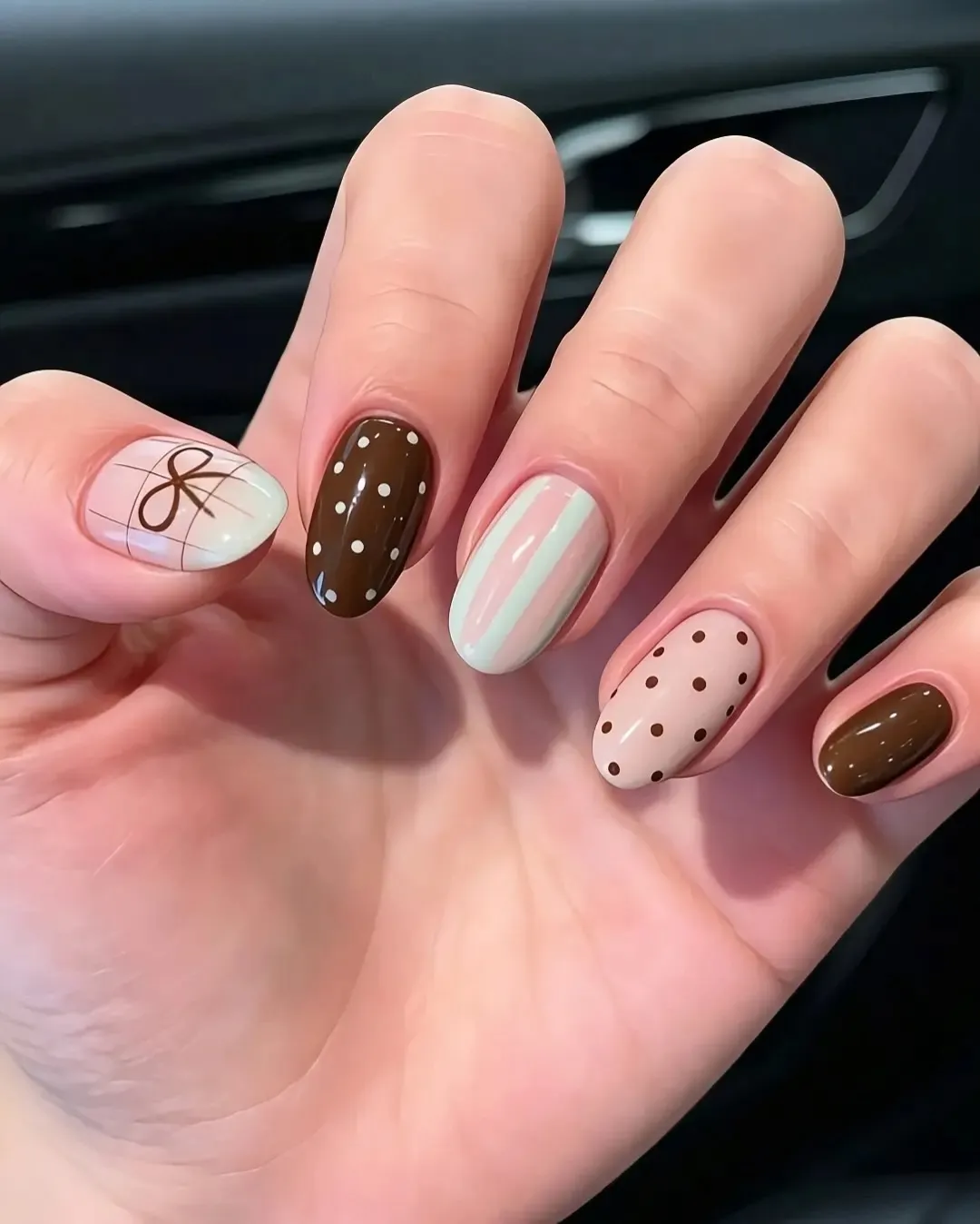 Neutral polka dots with stripes and a bow accent