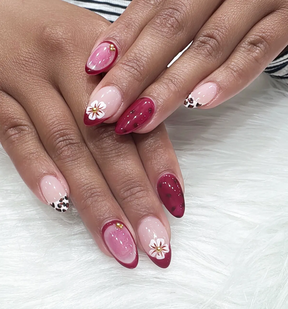 Pale pink and cherry mix with flower and leopard-tip accents