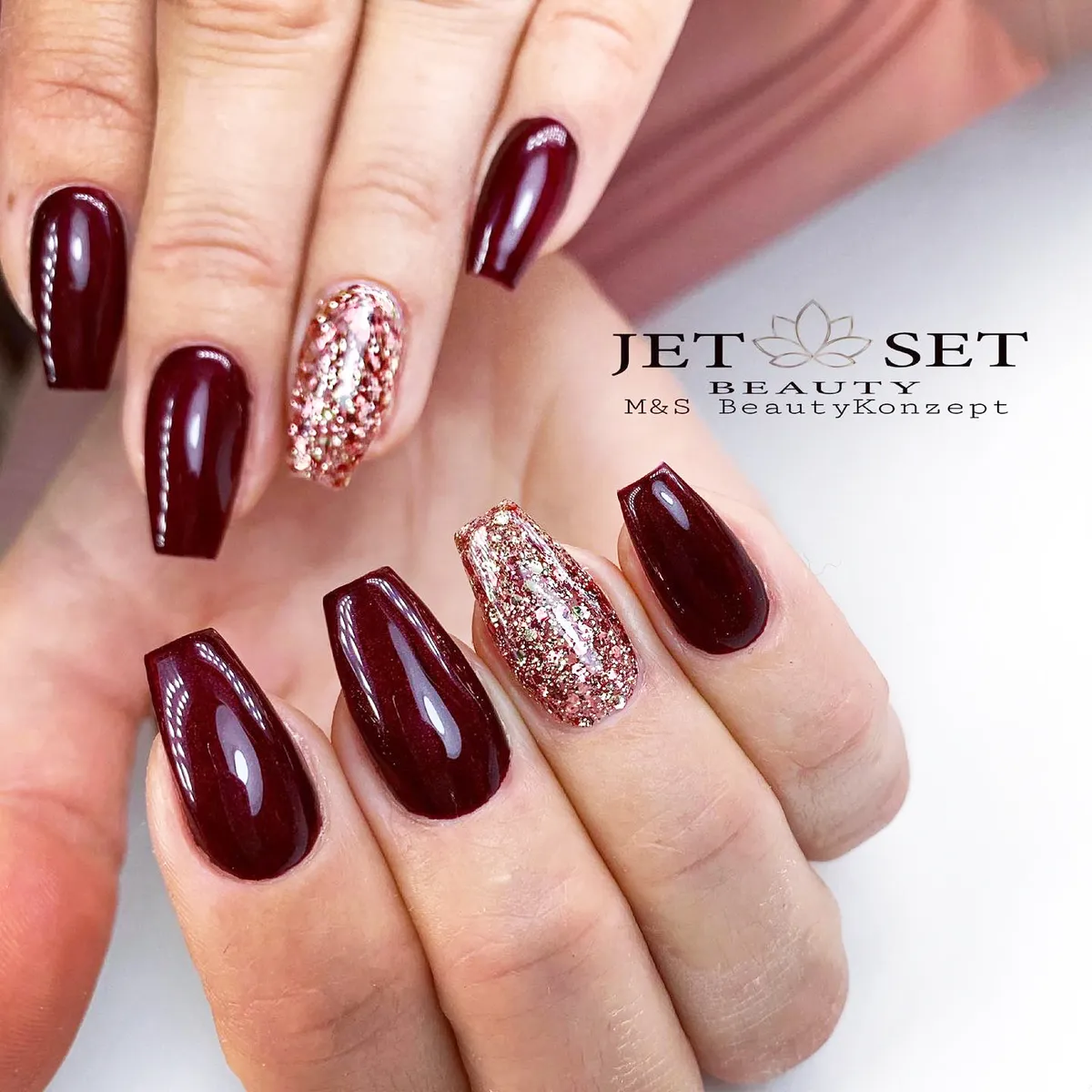 Deep cherry coffin nails with glitter accent nails