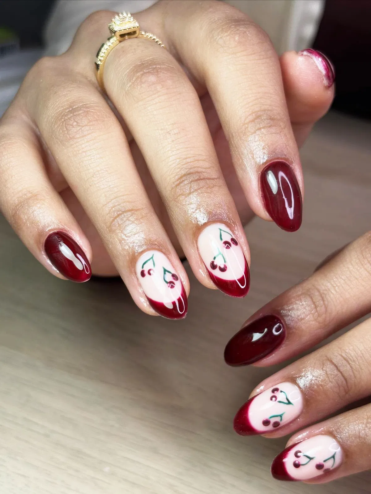 Cherry motif accents with deep red tips