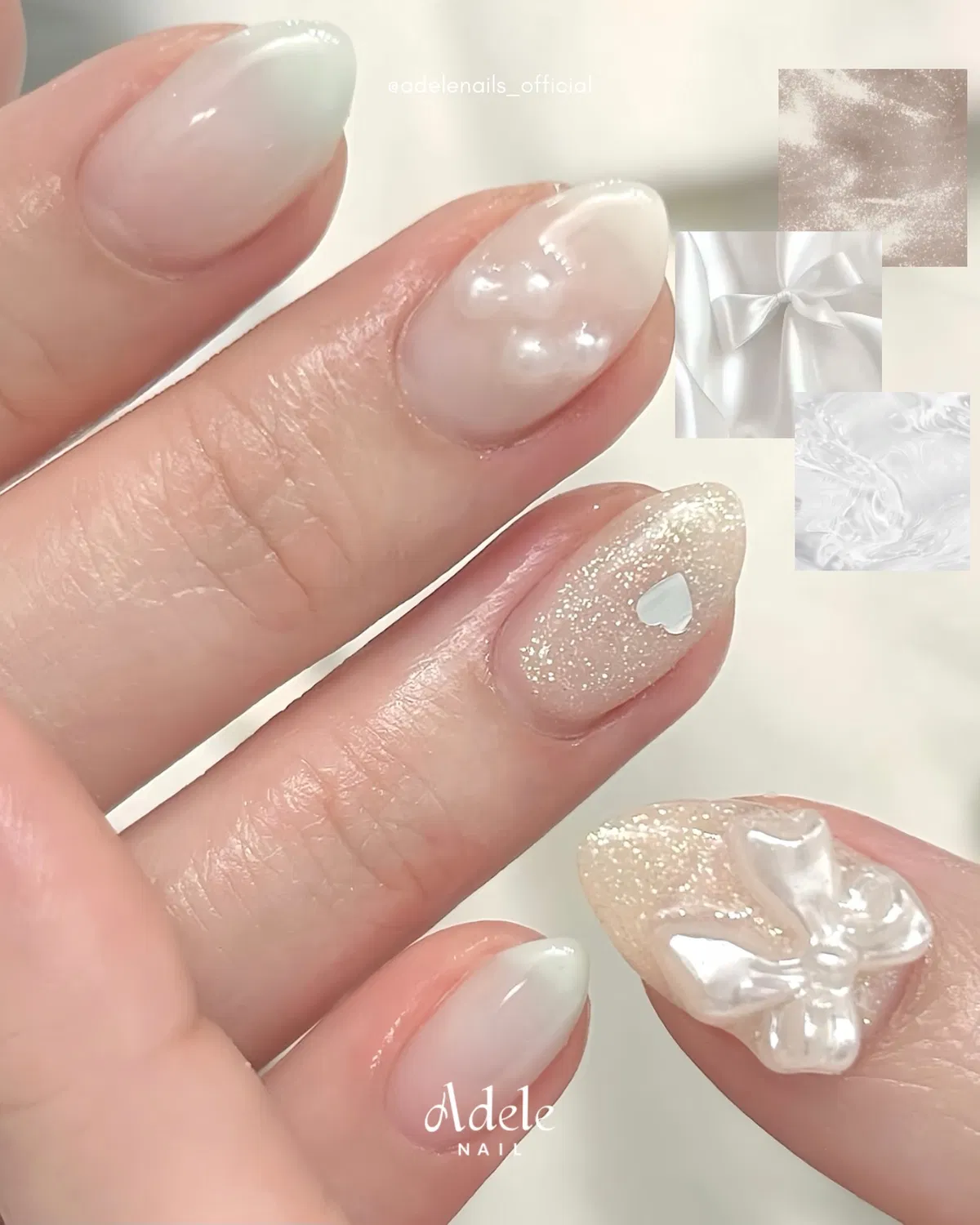 Milky white nails with glitter accent, small heart, and 3D bow
