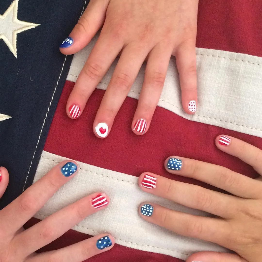 Mixed stripes, dots, and a heart accent across multiple hands
