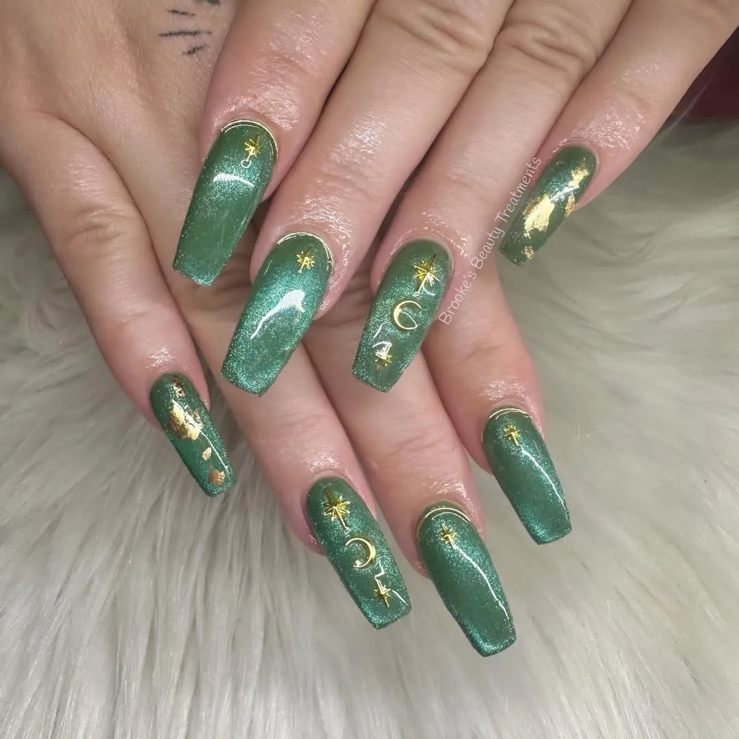 Green shimmer coffin nails with gold celestial details