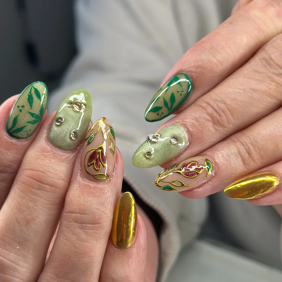 Pearly green with gold-outlined florals and bead accents