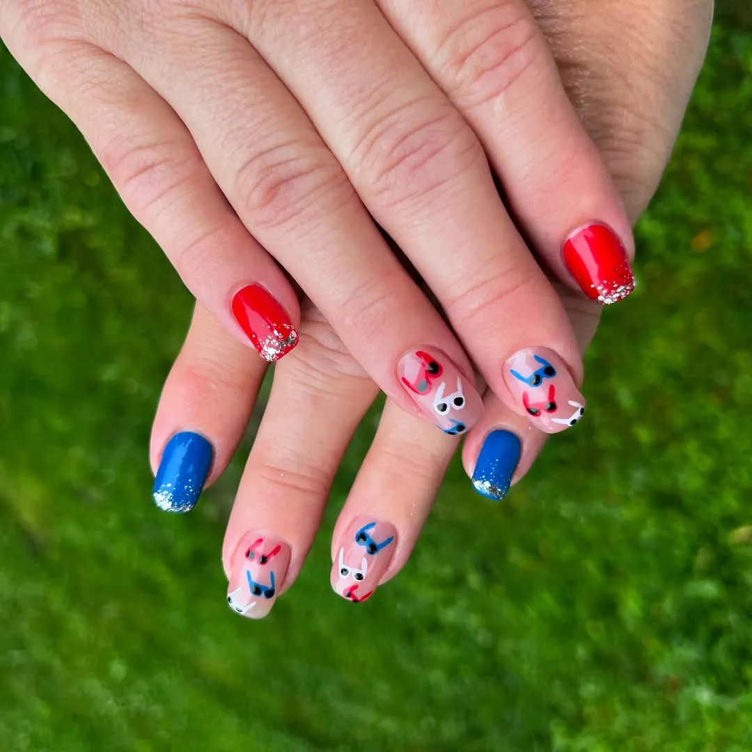 Red and blue solids with glitter tips and abstract accents