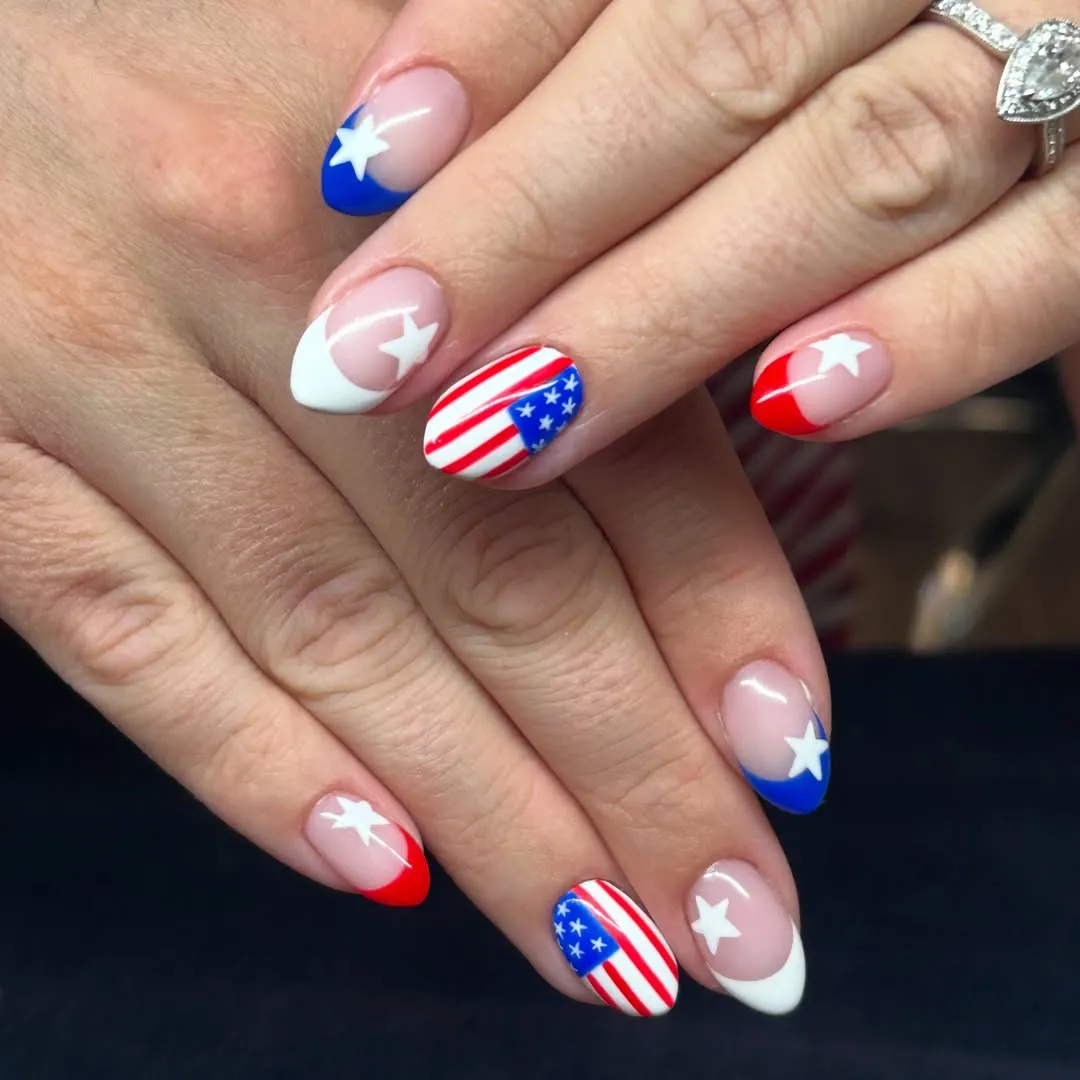 Star French tips with striped accent nails