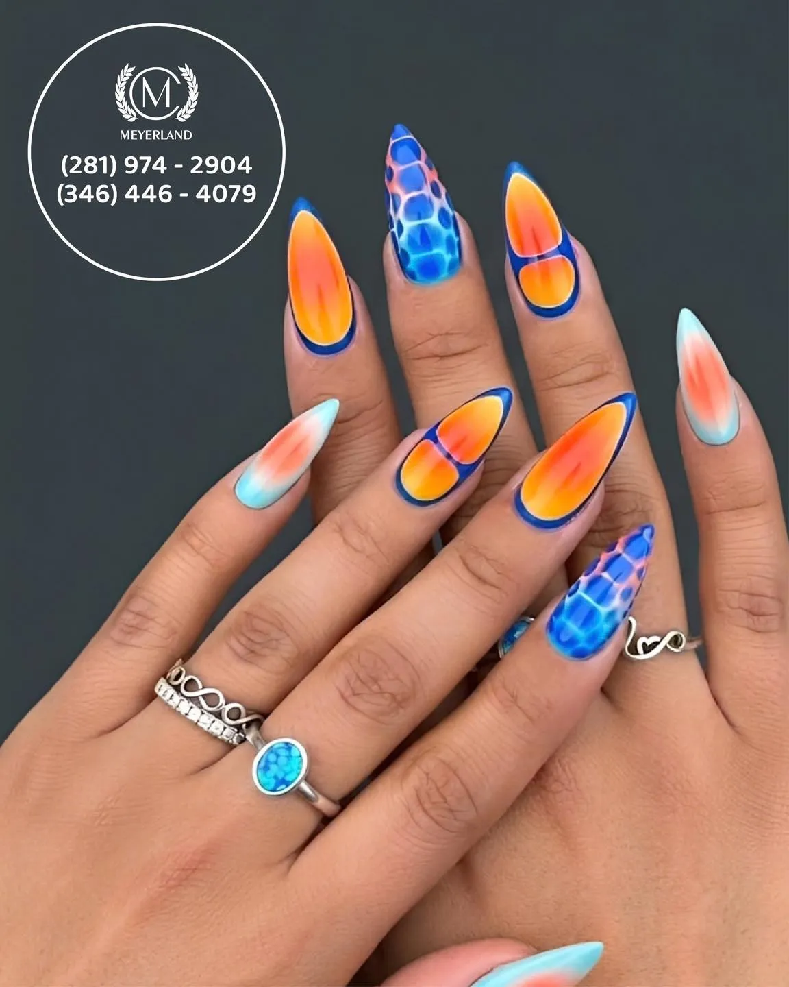 Orange ombrรฉ panels outlined in blue with blue patterned accents