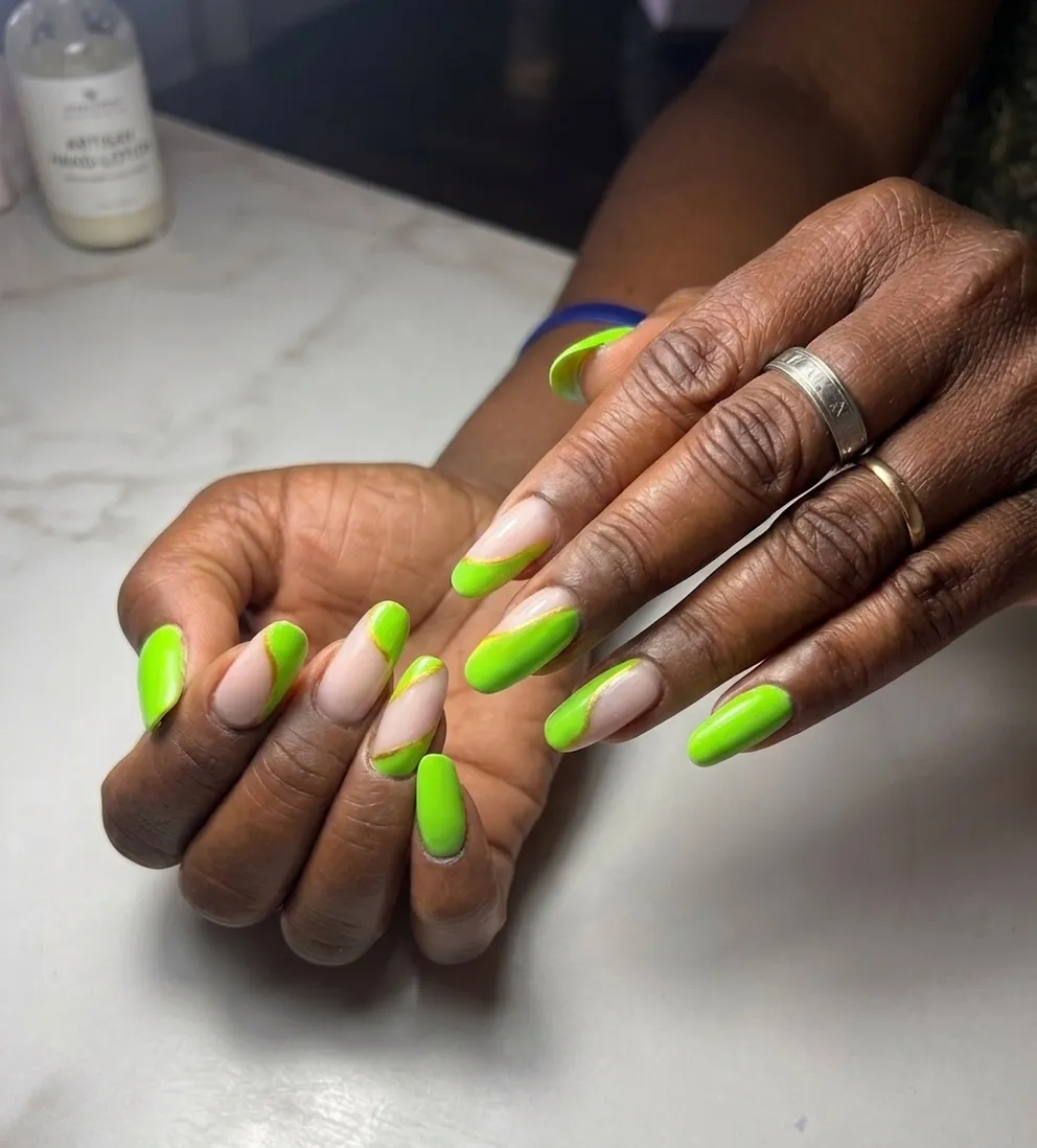 Lime green curved French tips on nude base