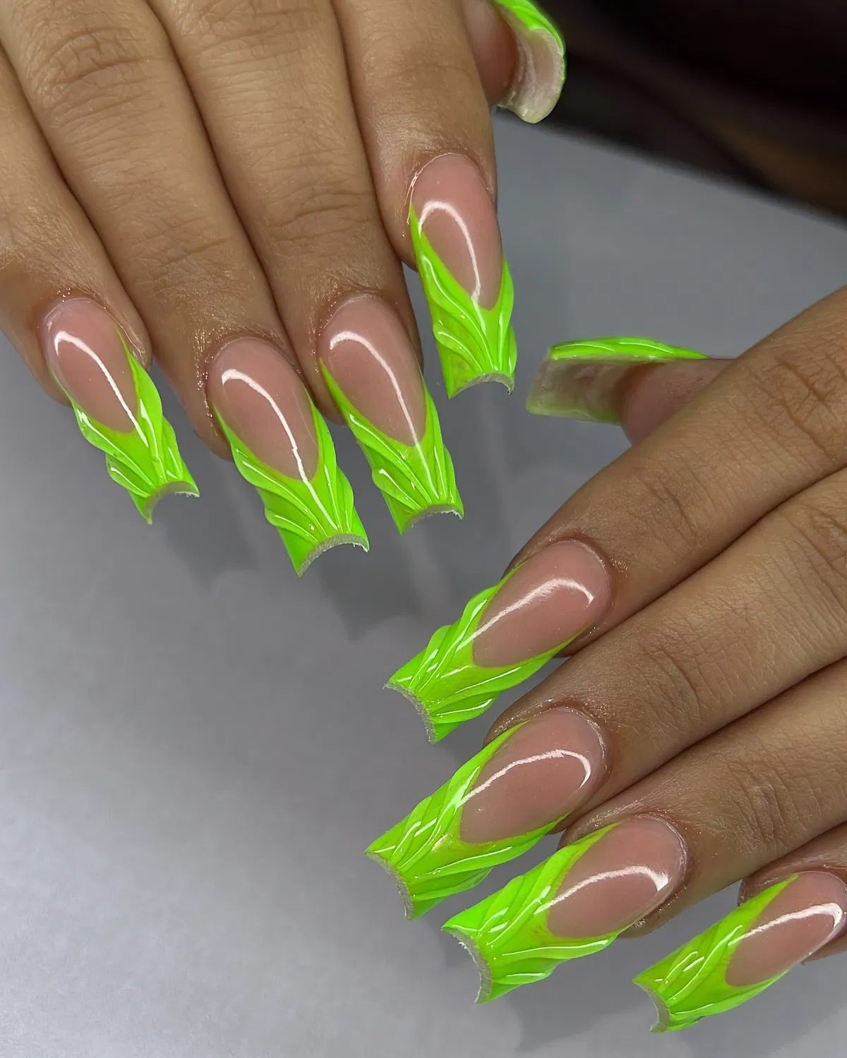 Neon lime sculpted tips with wavy detailing