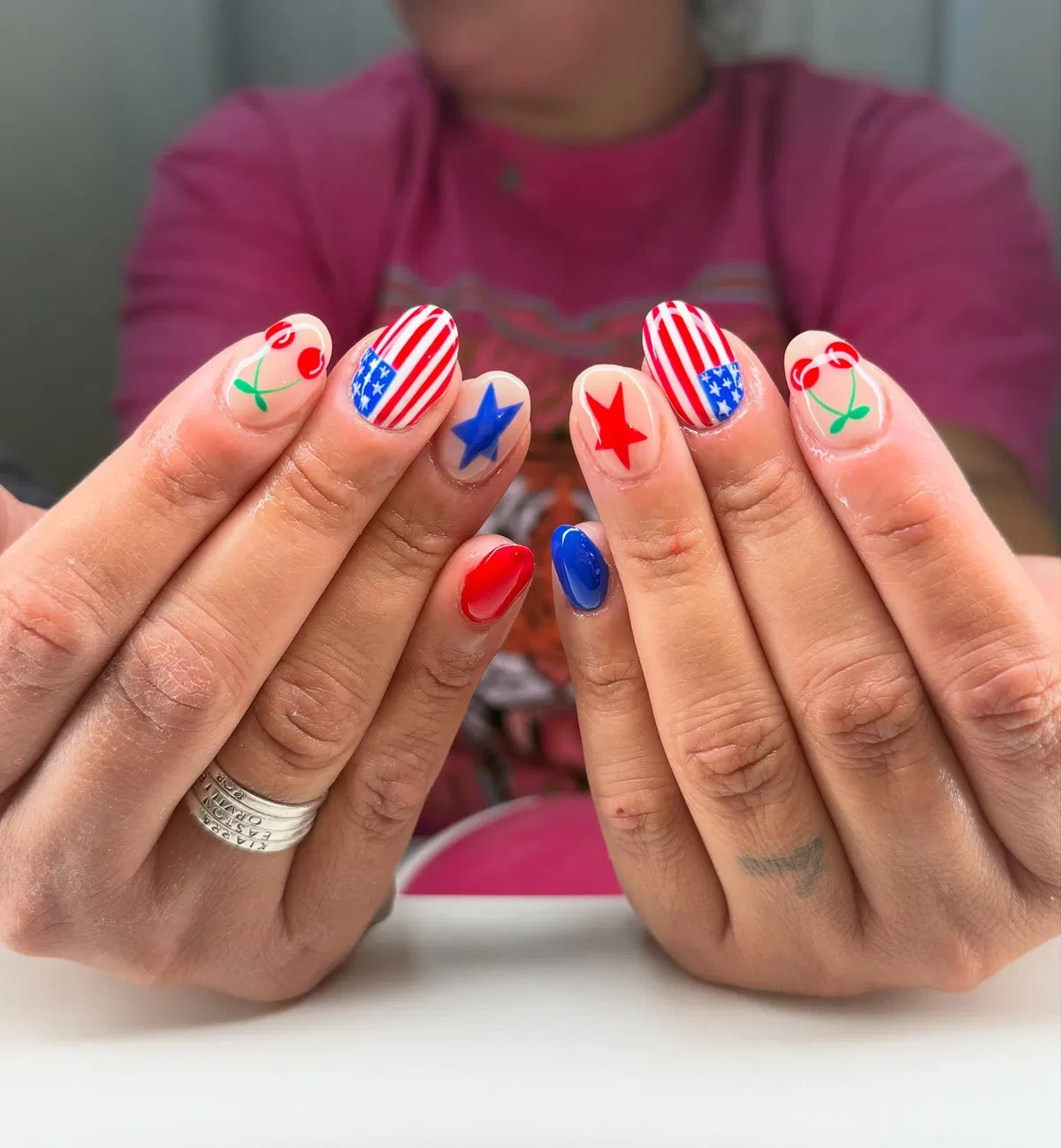Striped star-corner nails with cherry accents