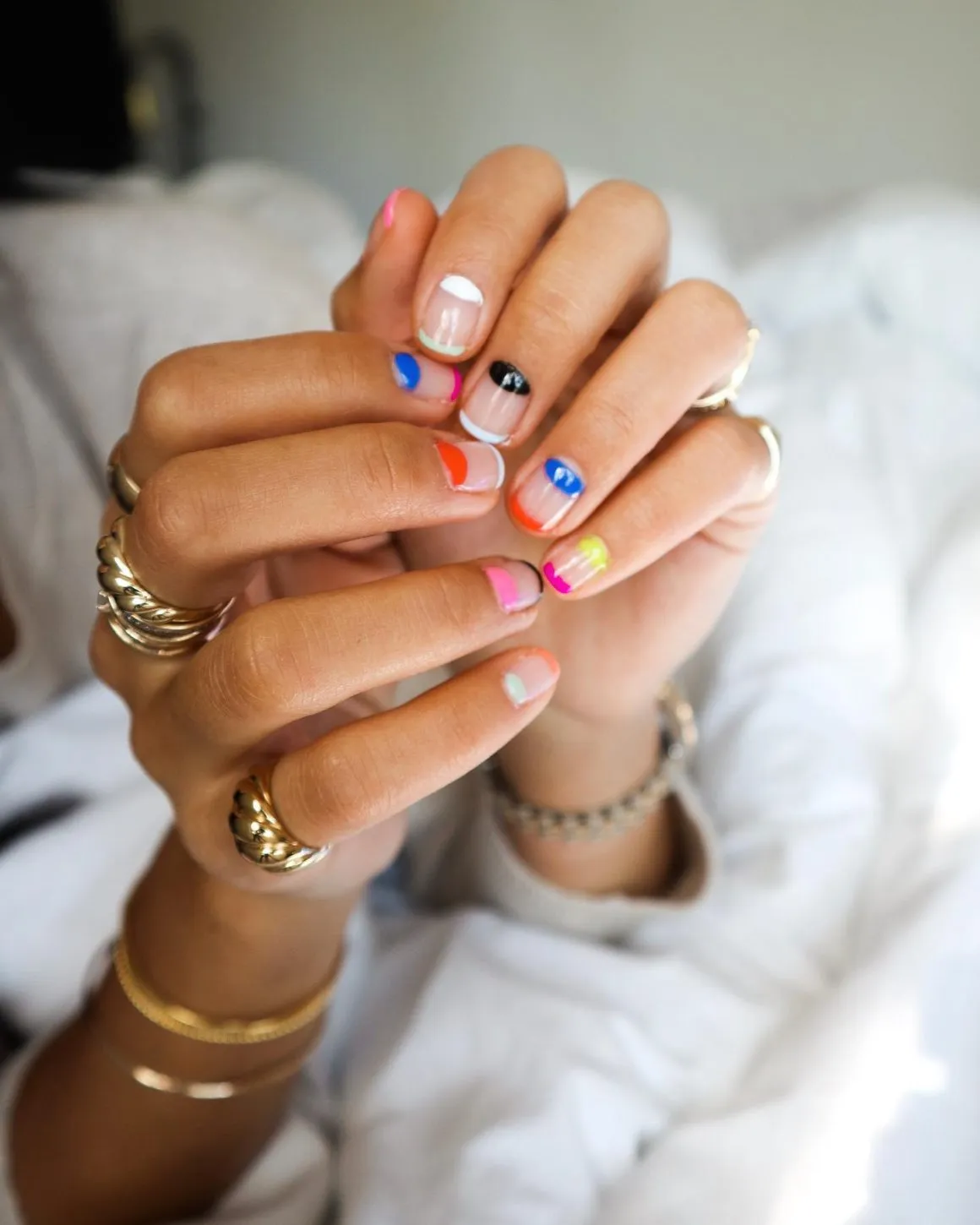Micro color-block French tips in mixed brights