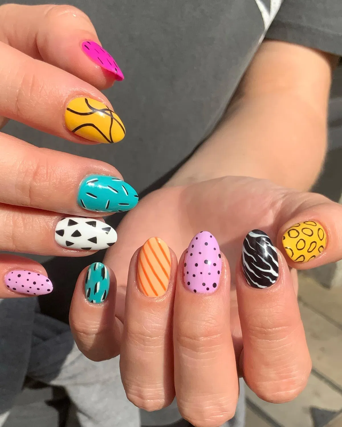 Bright graphic mix: dots, dashes, squiggles, and waves