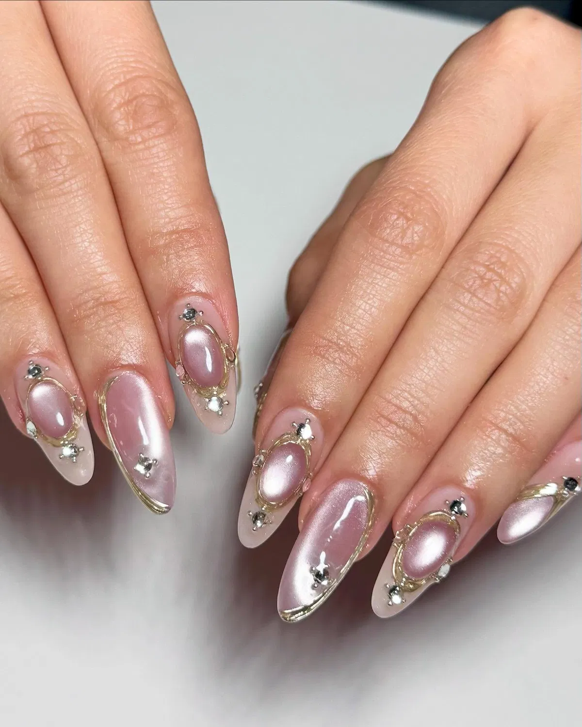 Pink chrome panels with gold frames and crystals
