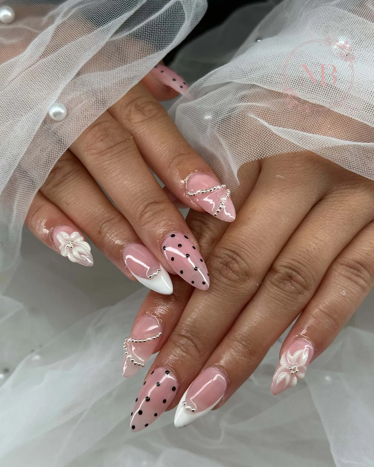 Pink polka dots with bead-chain curves and 3D flowers