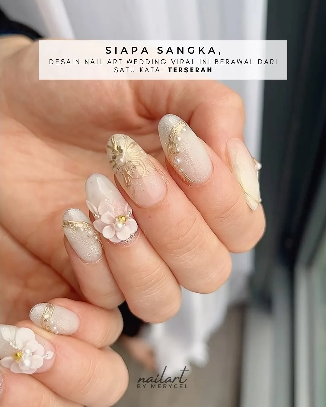 Nude almond nails with silver glitter tips, gold line accents, and raised flowers