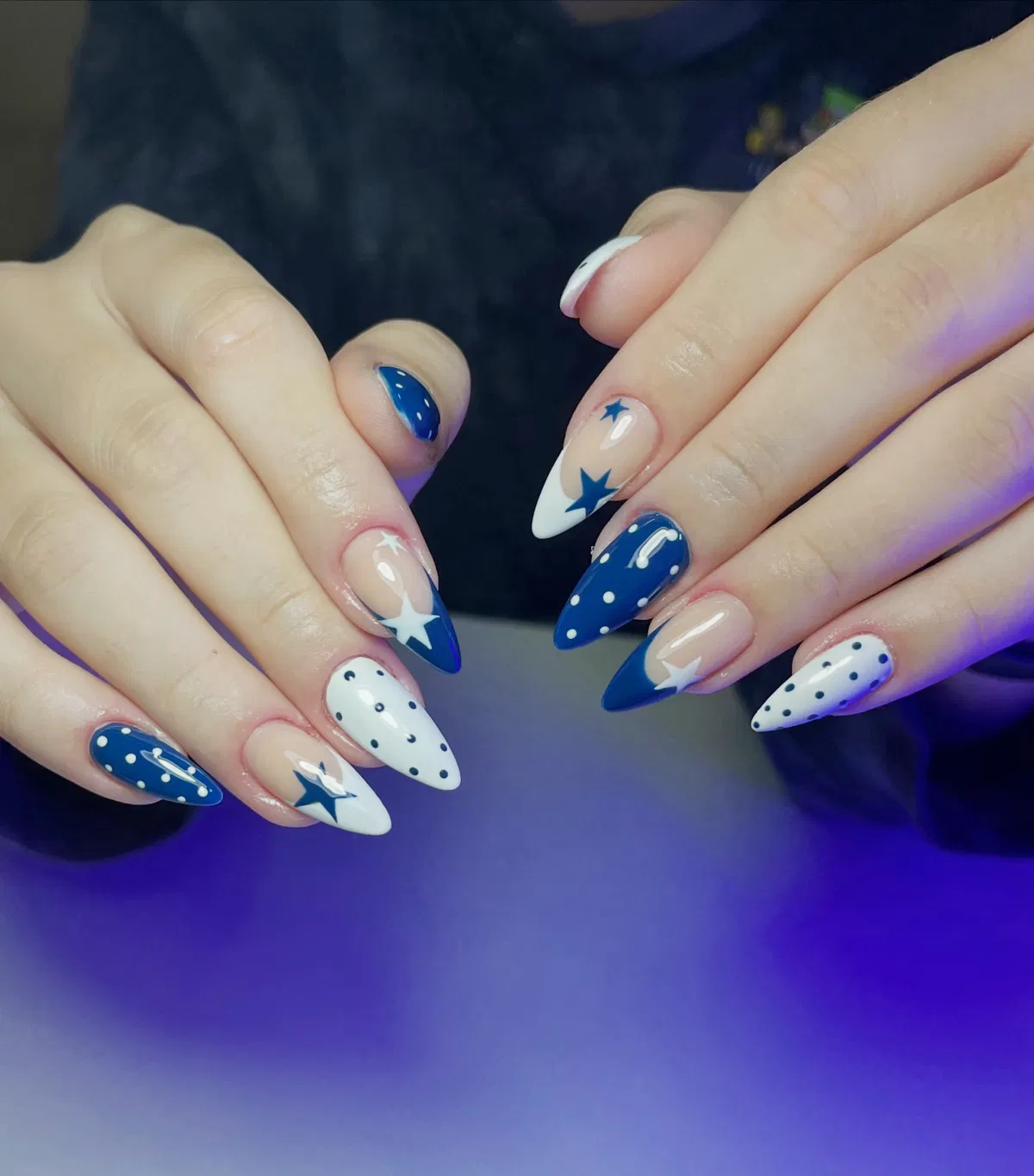 Pointed navy polka dots with bold star accents