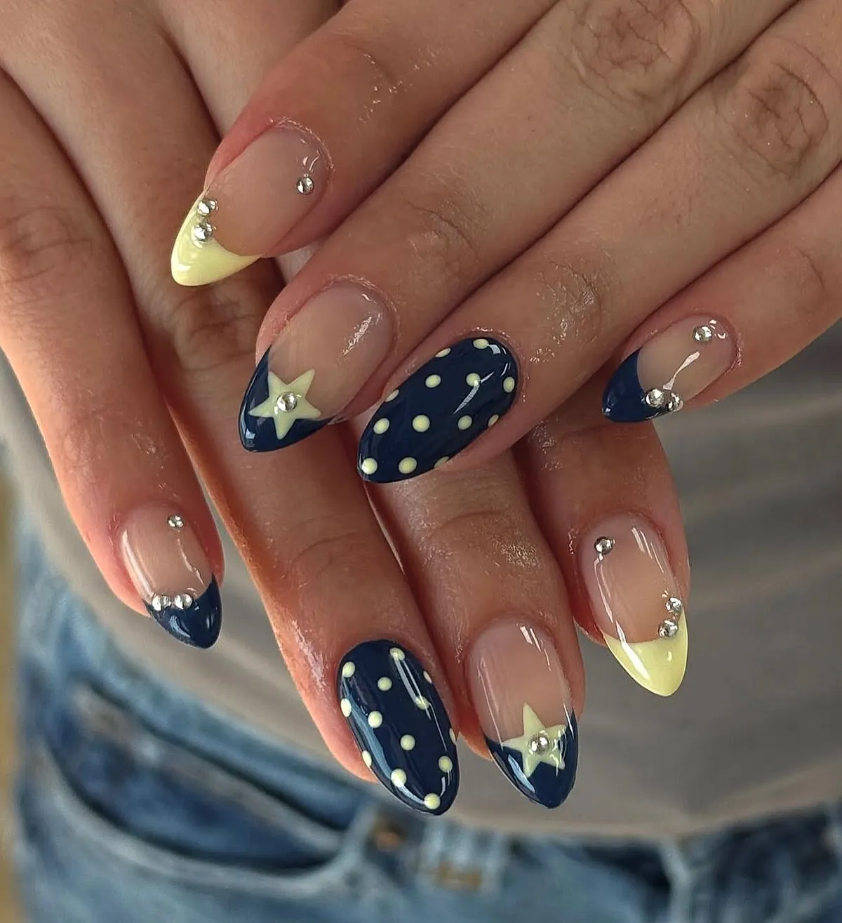 Navy tips with yellow polka dots, stars, and studs