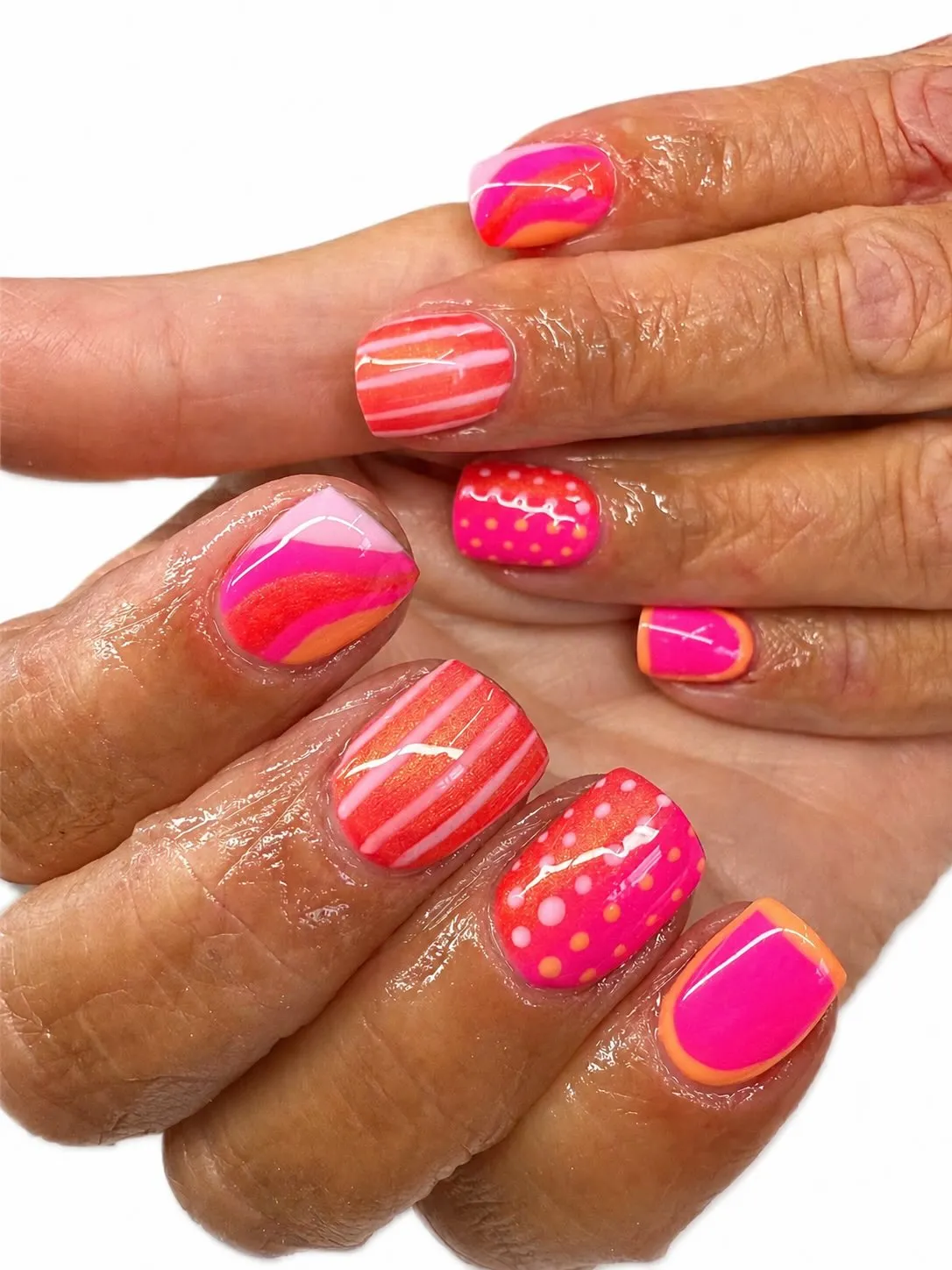 Neon pink-and-orange mix with stripes and polka dots