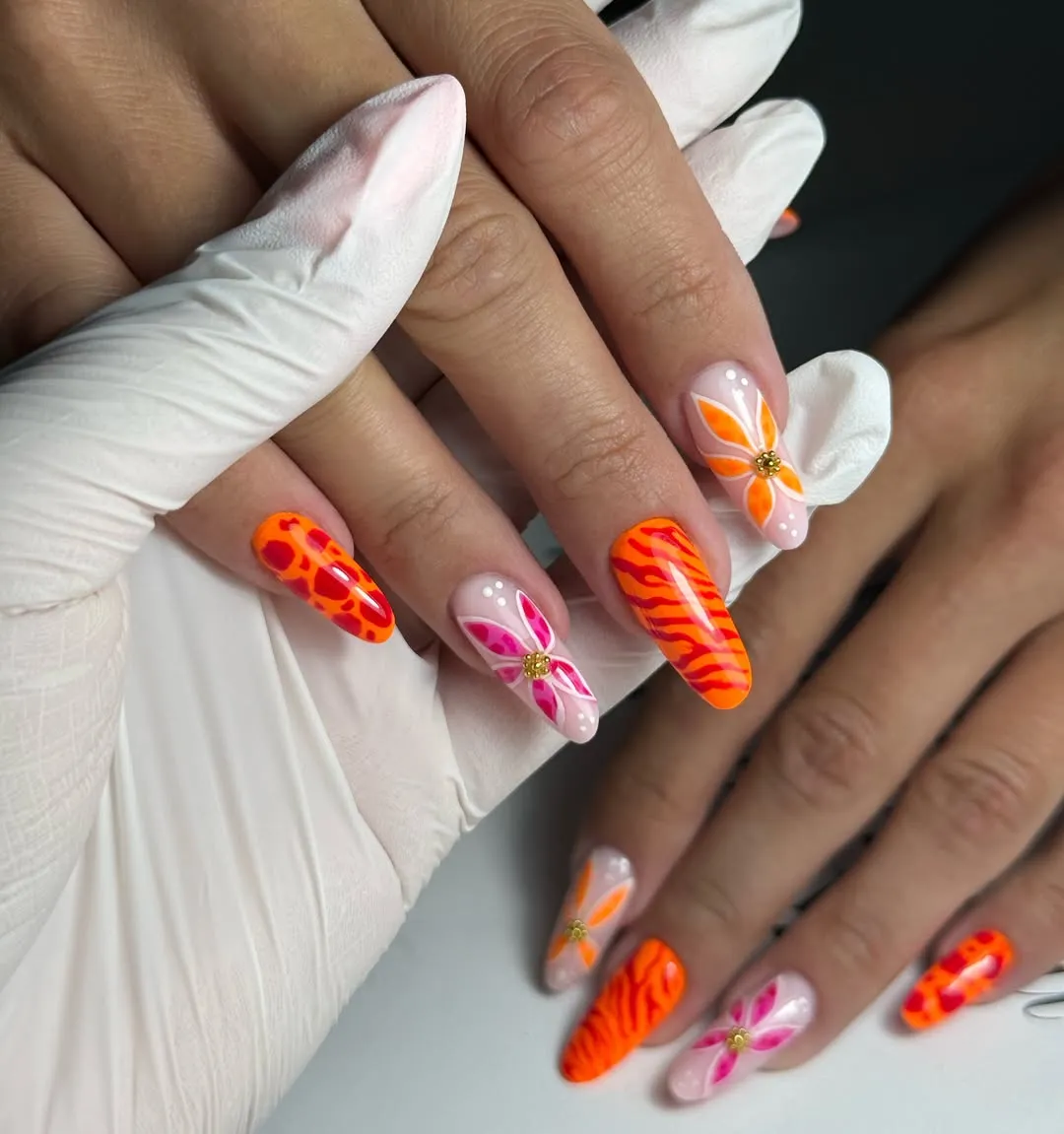 Stiletto neon orange with animal spots, wavy stripes, and 3D flowers