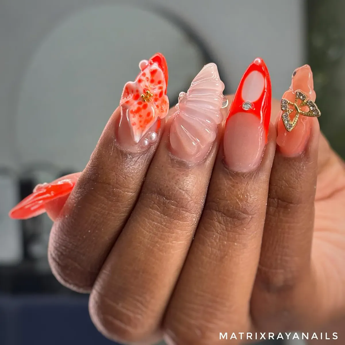 3D sculpted accents with orange-red outlines and charm details