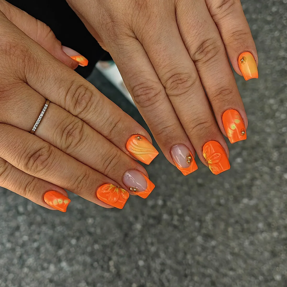 Short glossy orange set with gradients, line art, and gold studs