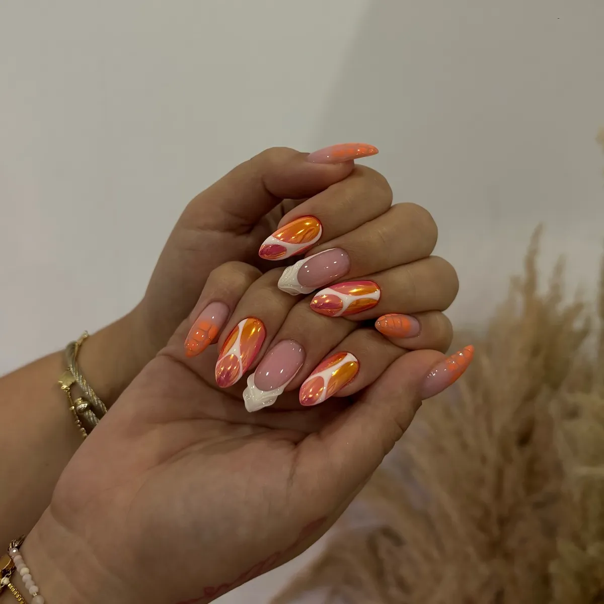 Orange reflective insets with white curves and nude base