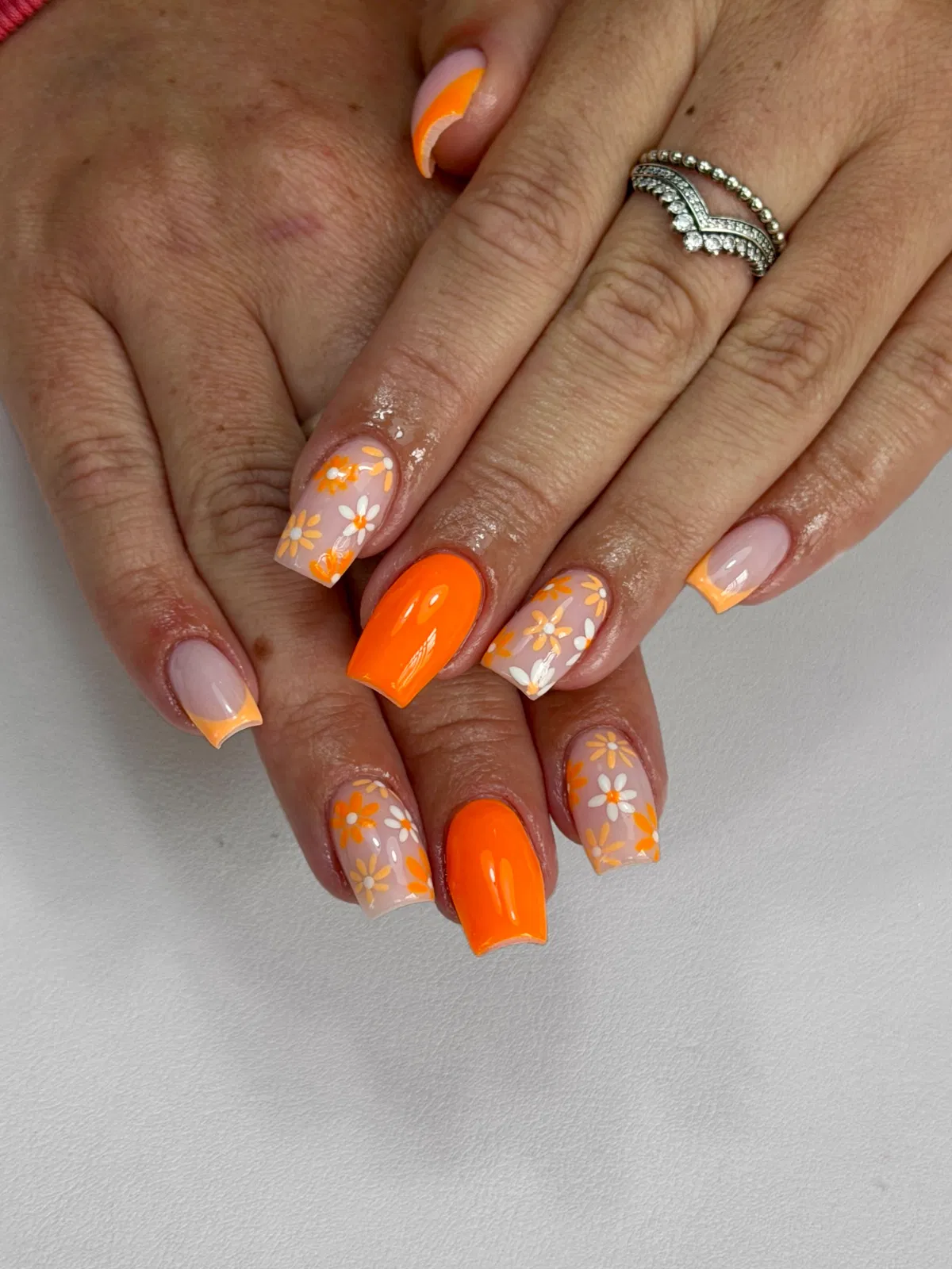 Bright orange solids with daisy floral accents